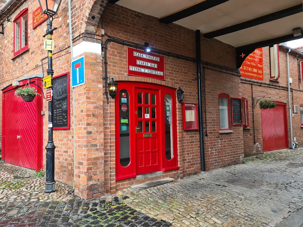 The red entrance to Casa Naranjo in Barracks Passage, Shrewsbury